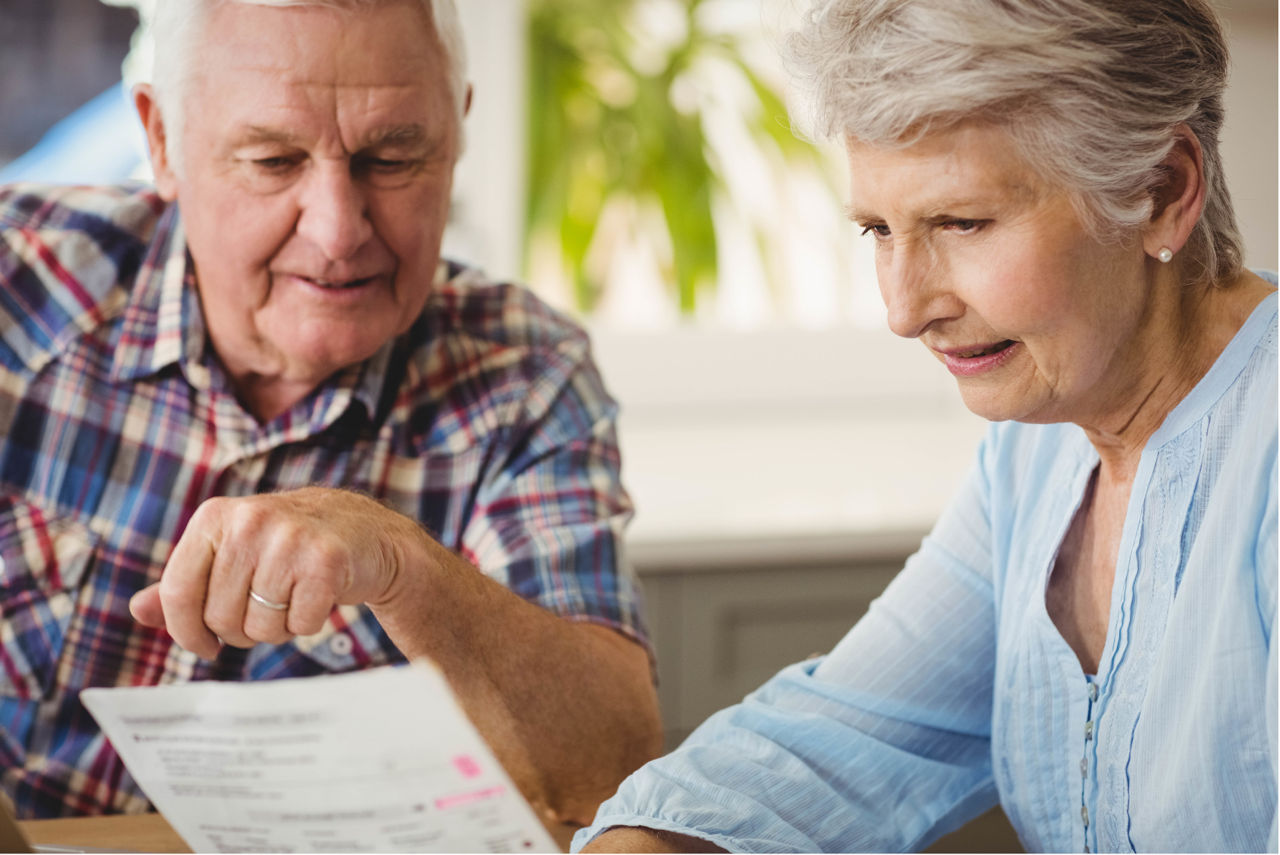 Medicare beneficiary reviewing medical bills